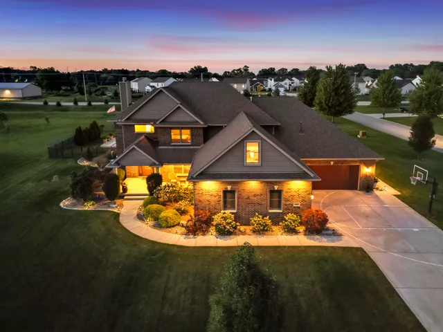 a view of a swimming pool with an outdoor seating