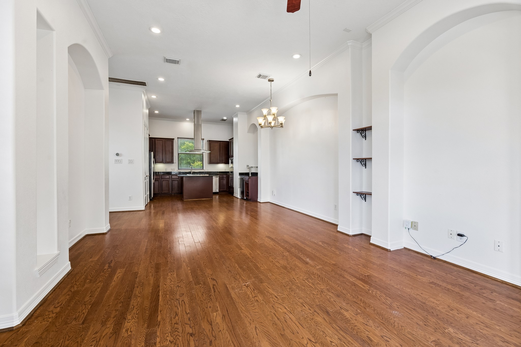 4102 Bonner View Lane Houston, TX 77007 - Photo 3 of 14 a view of a living room with kitchen and wooden floor