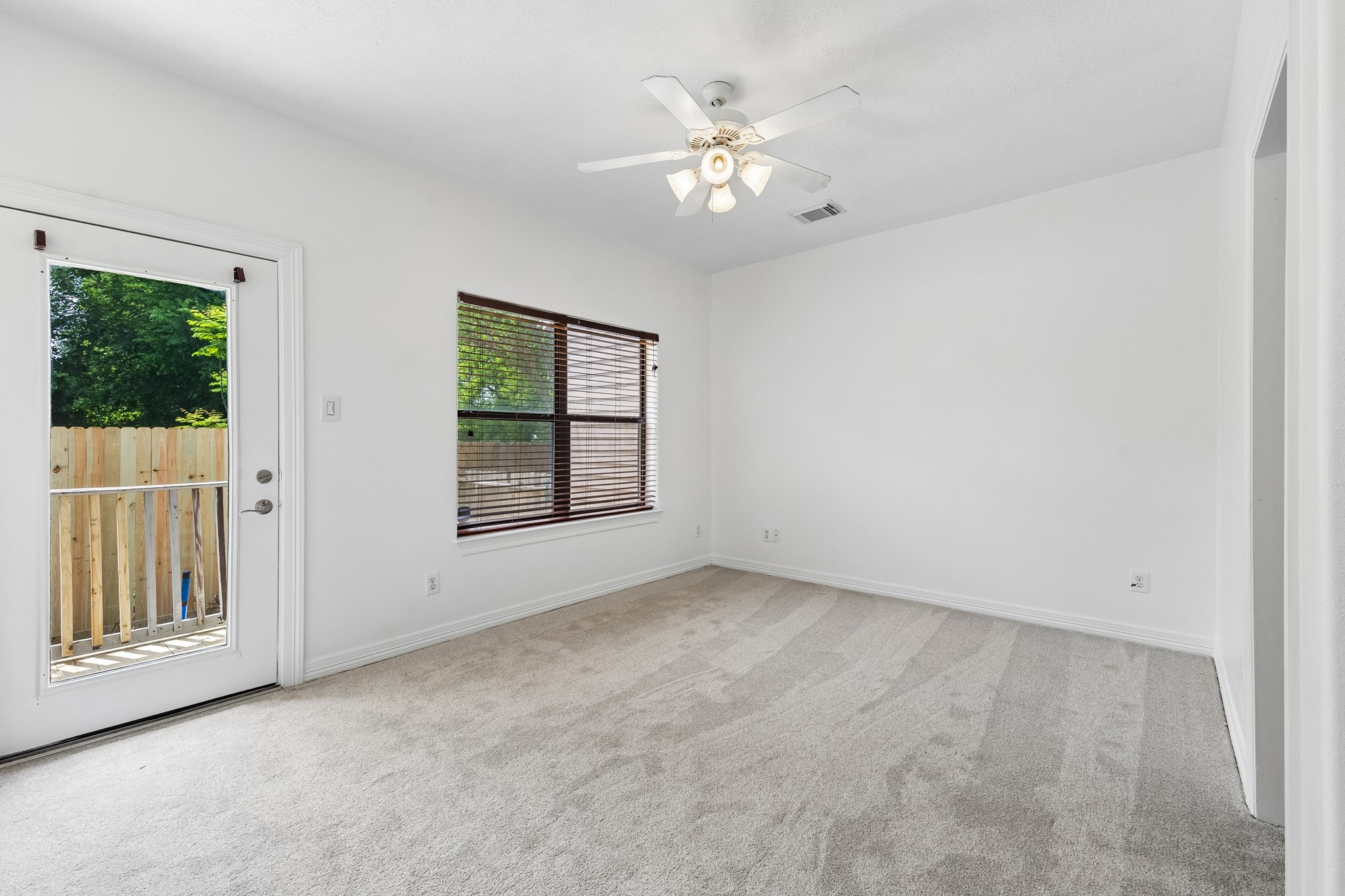 4102 Bonner View Lane Houston, TX 77007 - Photo 7 of 14 wooden floor in an empty room with a window