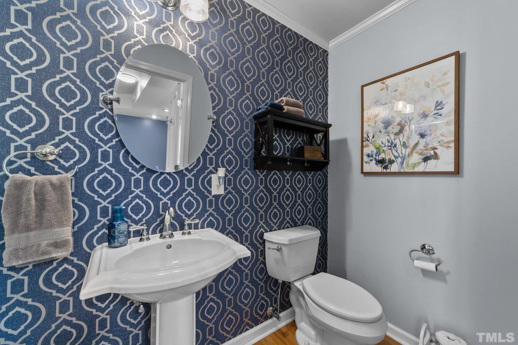 225 North Ridge Circle Roxboro, NC 27574 - Photo 12 of 33 a bathroom with a toilet sink and mirror