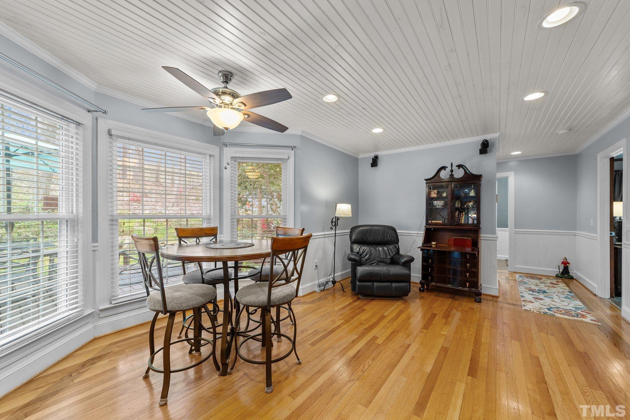 225 North Ridge Circle Roxboro, NC 27574 - Photo 7 of 33 a view of a dining room with furniture window and wooden floor