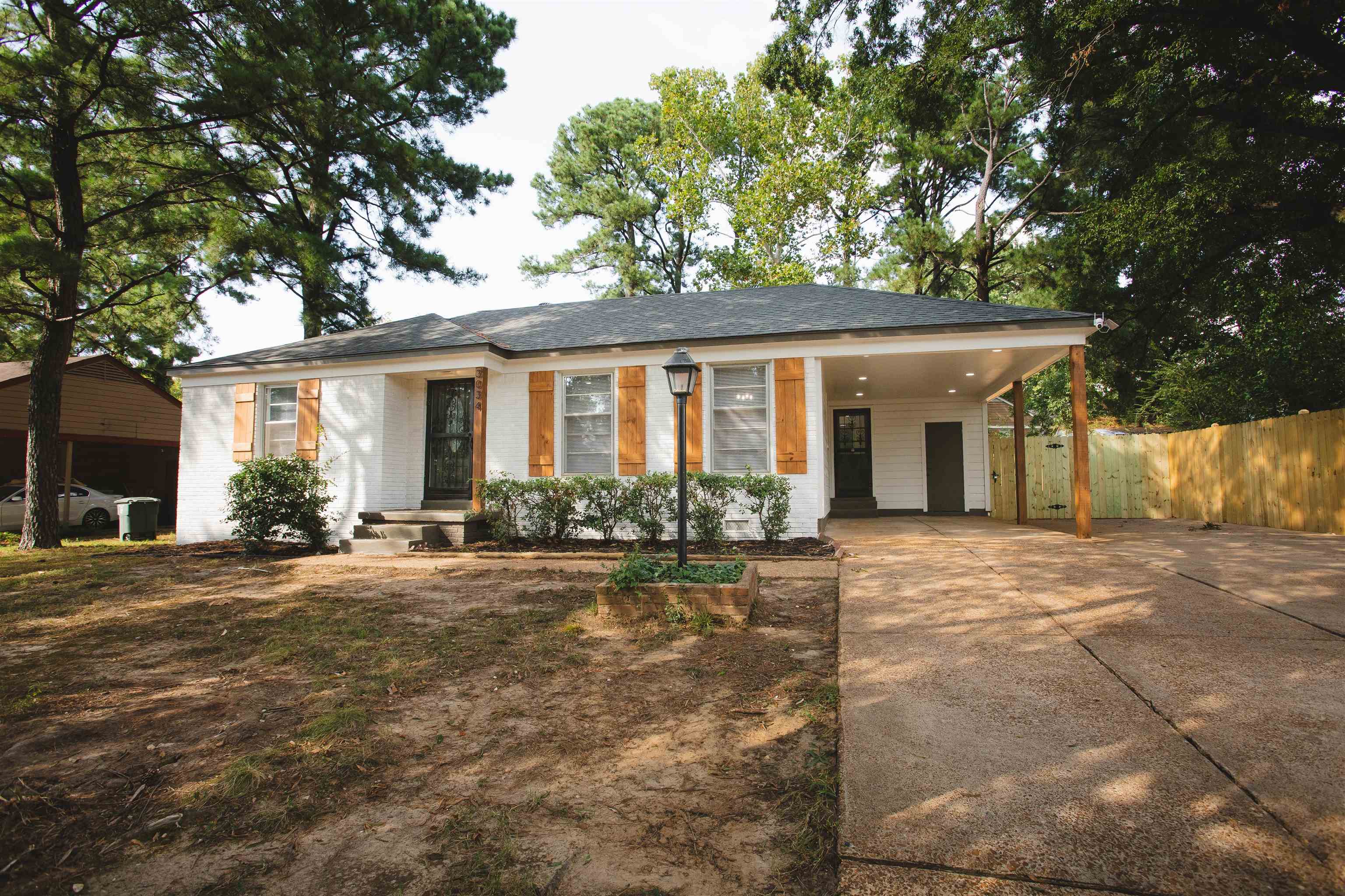 3034 Christine Road Memphis, TN 38118 - Photo 1 of 26 front view of a house with a patio