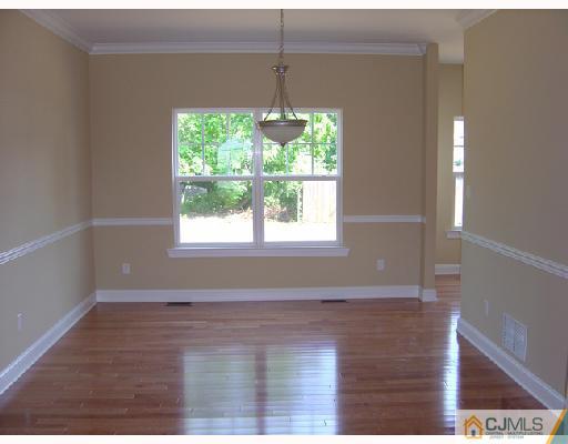 408 Old Georges Road North Brunswick, NJ 08902 - Photo 3 of 7 a view of a room with wooden floor and windows
