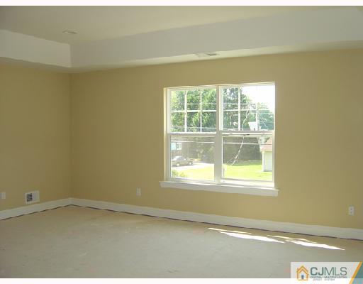 408 Old Georges Road North Brunswick, NJ 08902 - Photo 7 of 7 an empty room with a window