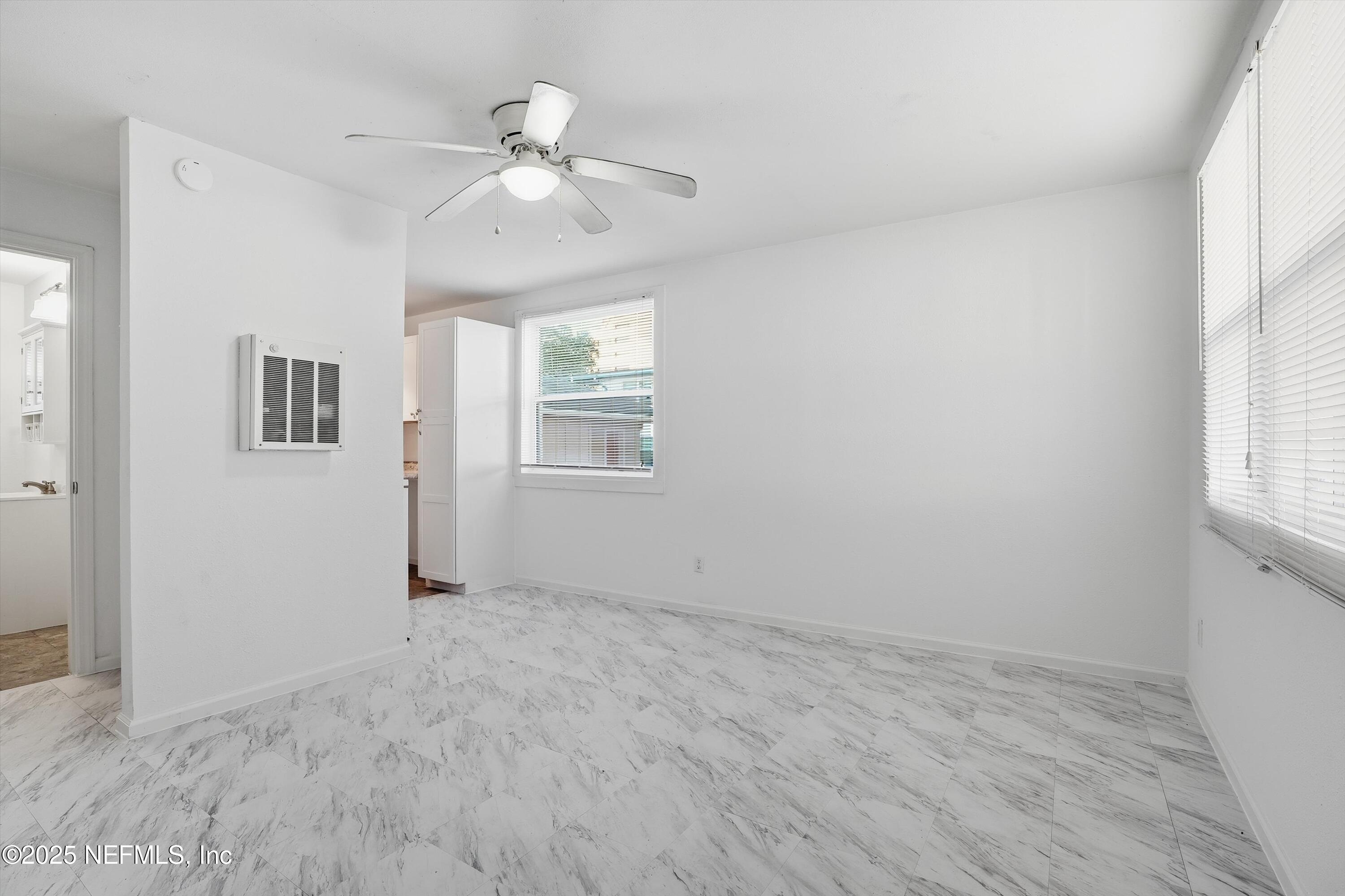 911 Phillips Street Jacksonville, FL 32207 - Photo 27 of 36 a view of an empty room with a window