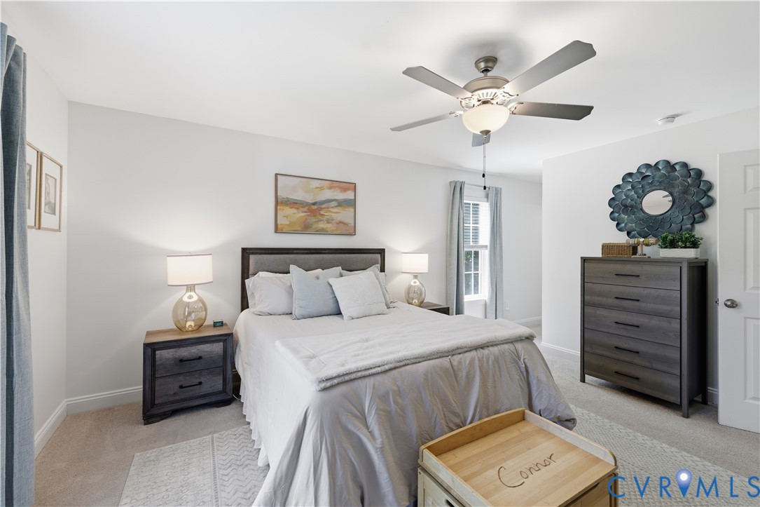 222 Oak Ridge Court Aylett, VA 23009 - Photo 18 of 35 Carpeted bedroom with a ceiling fan light fixture,