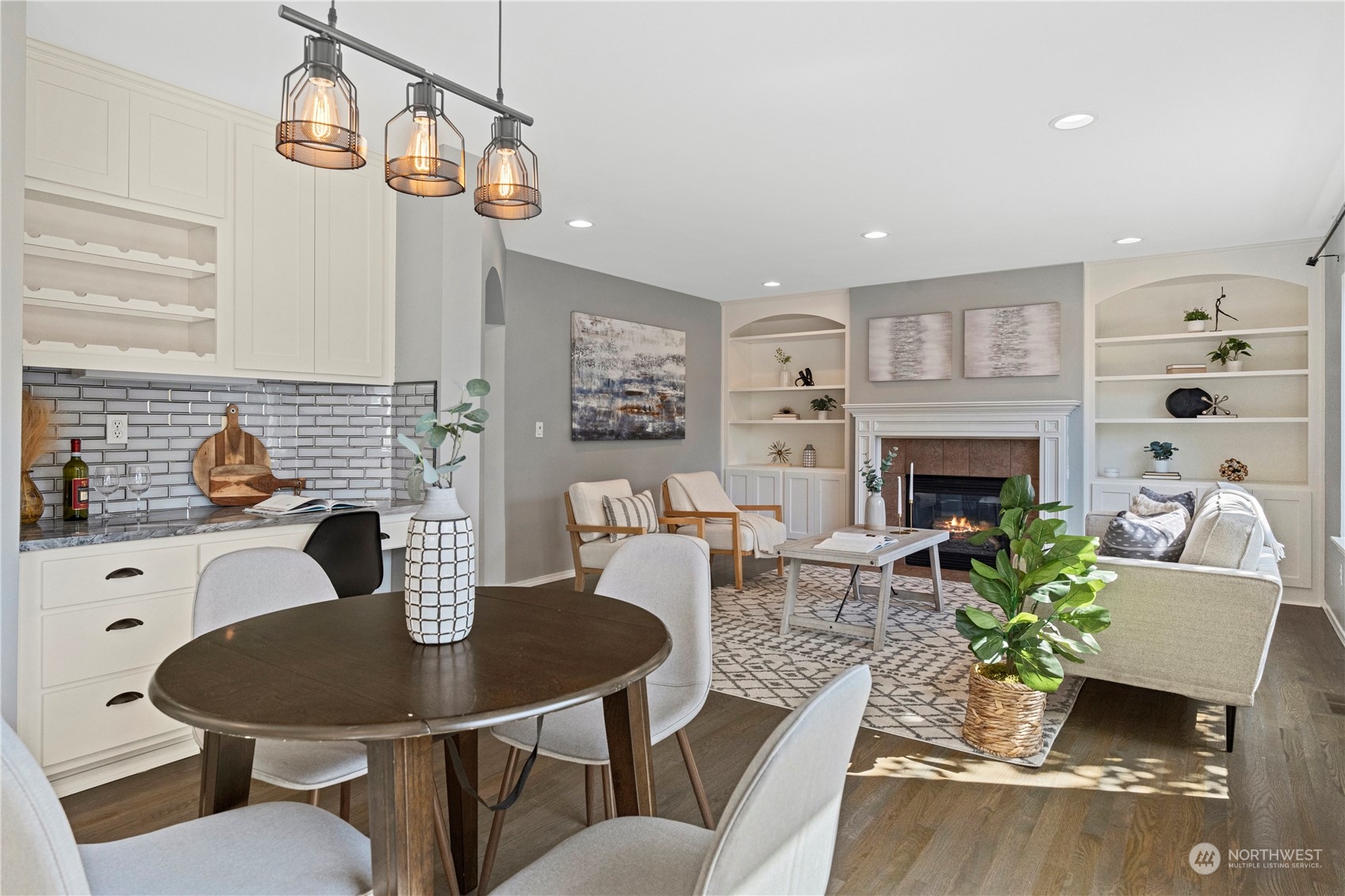 4410 239th Place Southeast Bothell, WA 98021 - Photo 13 of 40 a living room with fireplace furniture and a wooden floor
