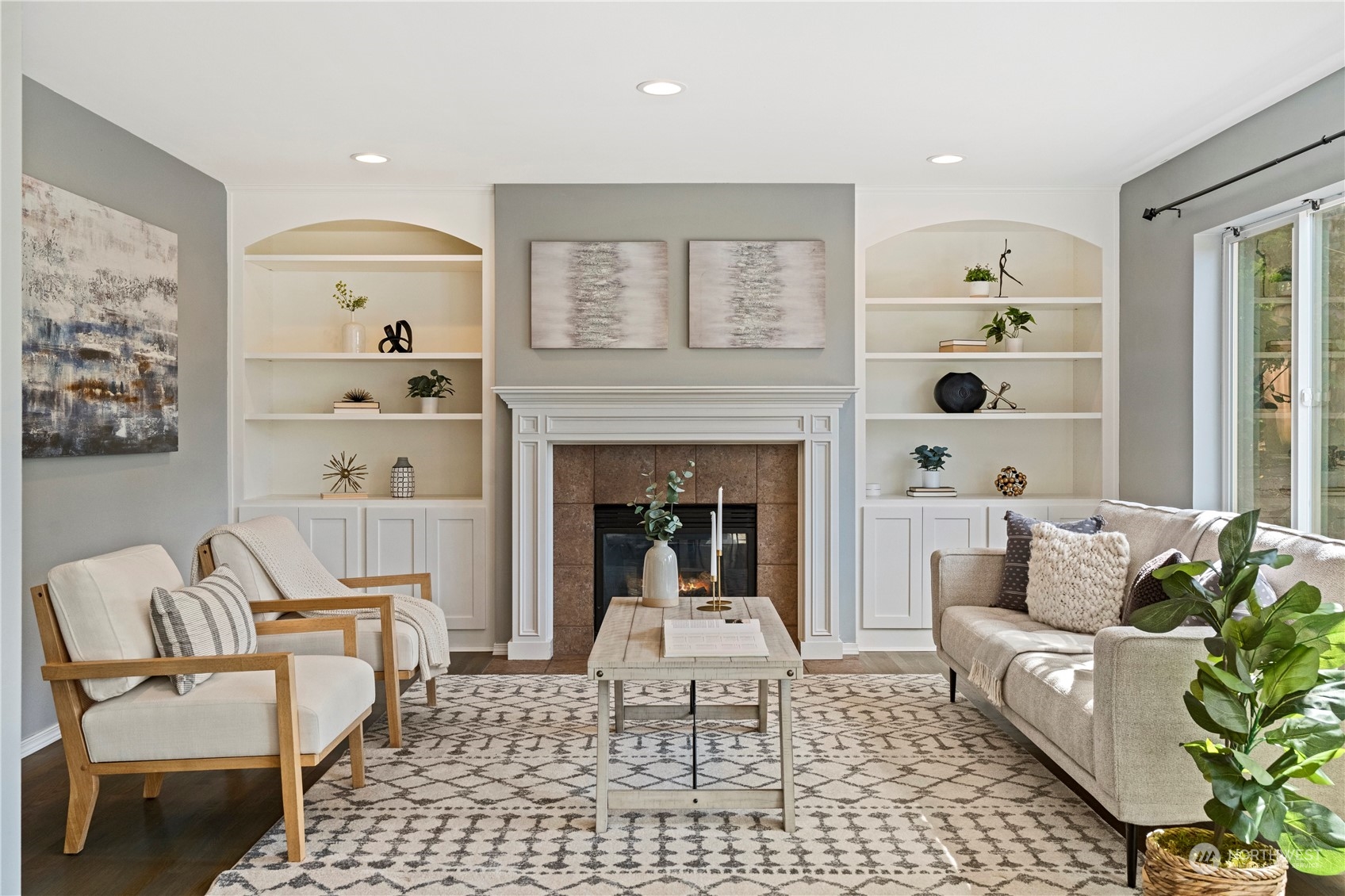 4410 239th Place Southeast Bothell, WA 98021 - Photo 14 of 40 a living room with furniture and a fireplace
