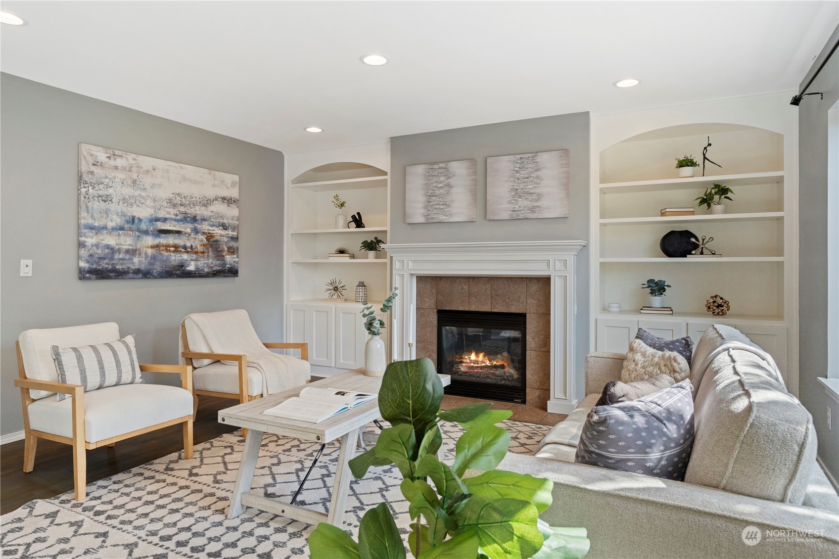 4410 239th Place Southeast Bothell, WA 98021 - Photo 15 of 40 a living room with furniture and a fireplace
