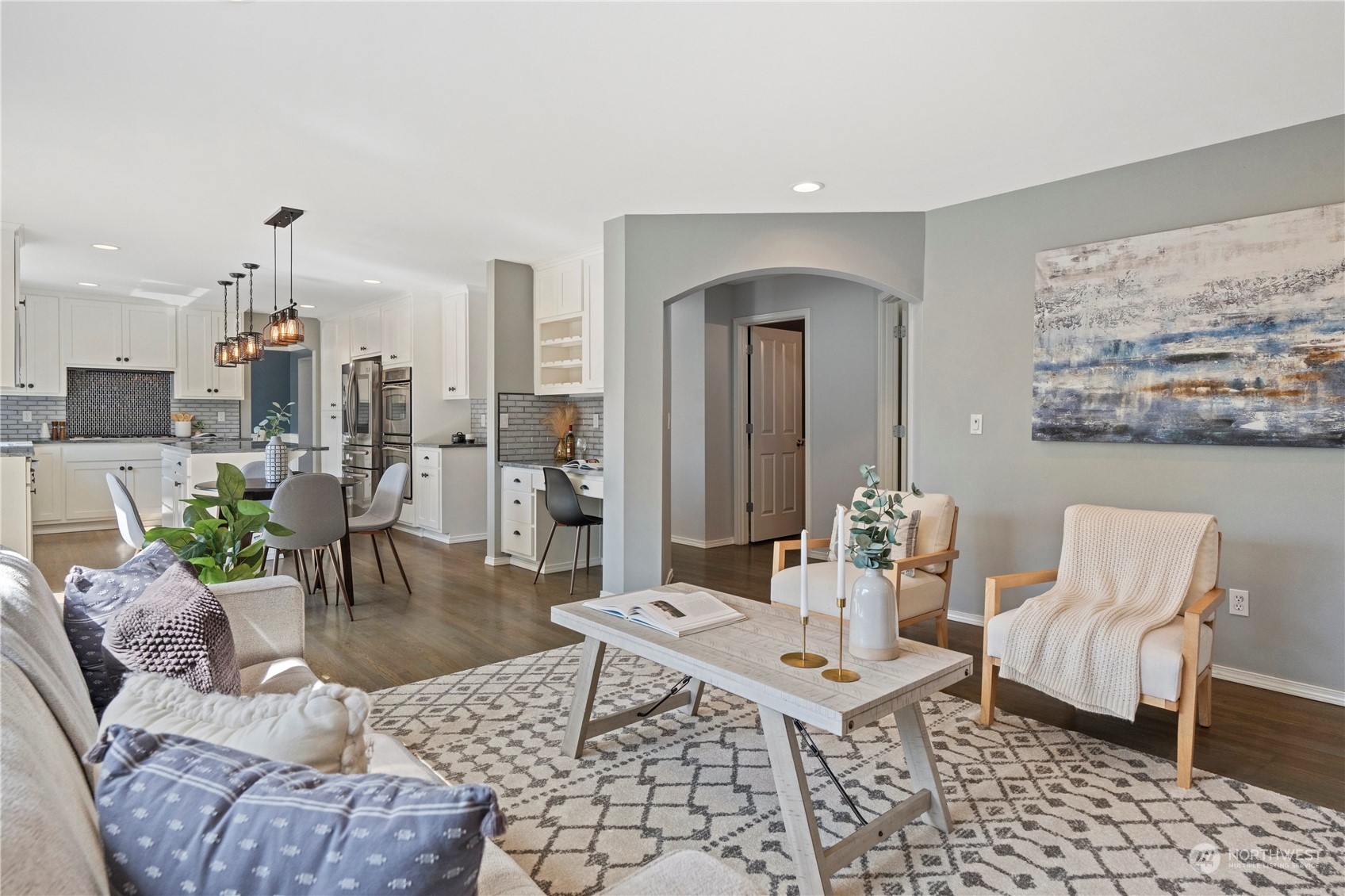 4410 239th Place Southeast Bothell, WA 98021 - Photo 16 of 40 a living room with furniture and a painting on the wall