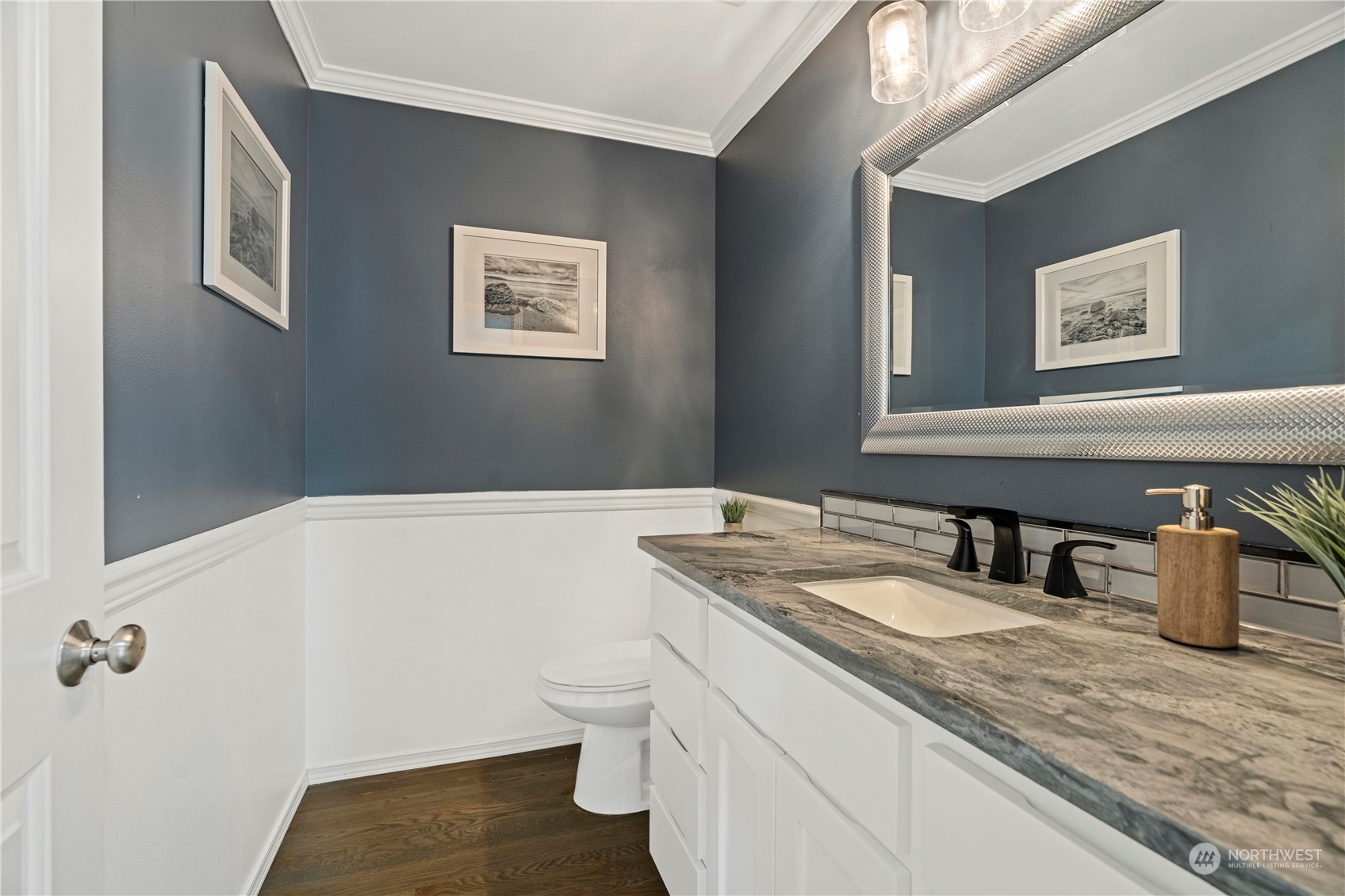 4410 239th Place Southeast Bothell, WA 98021 - Photo 20 of 40 a bathroom with a granite countertop sink and a mirror