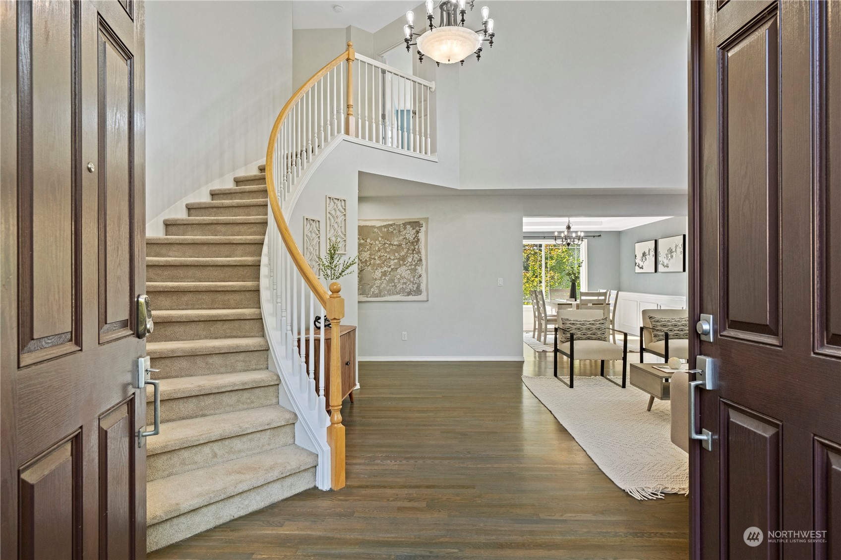 4410 239th Place Southeast Bothell, WA 98021 - Photo 2 of 40 a view of entryway and hall with wooden floor