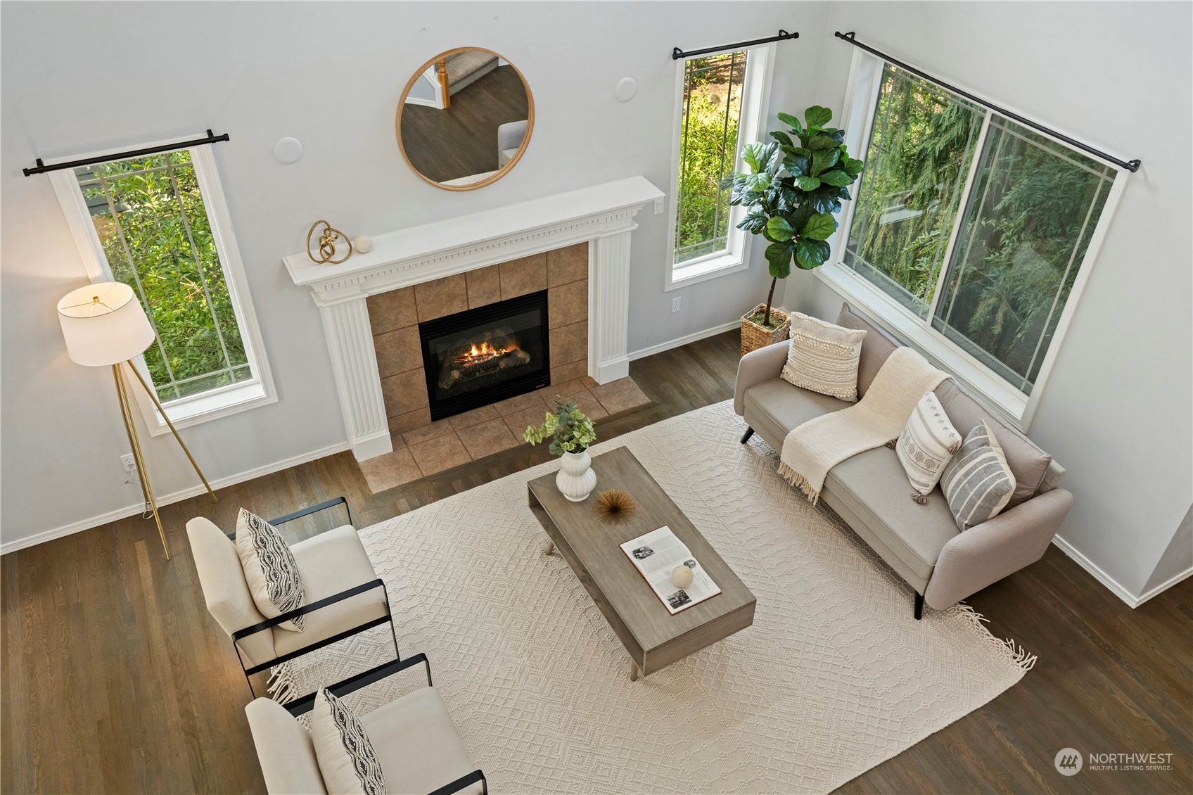 4410 239th Place Southeast Bothell, WA 98021 - Photo 21 of 40 a living room with furniture and a fireplace
