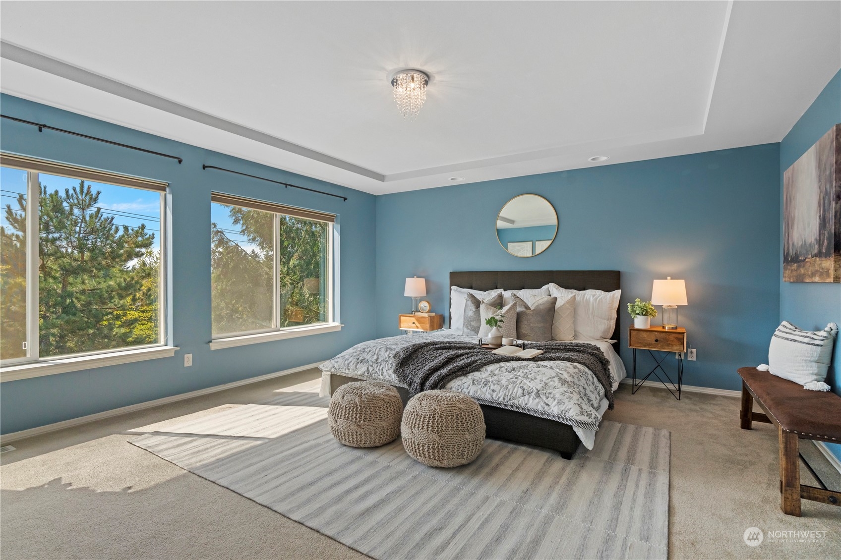 4410 239th Place Southeast Bothell, WA 98021 - Photo 22 of 40 a bedroom with a bed and wooden floor