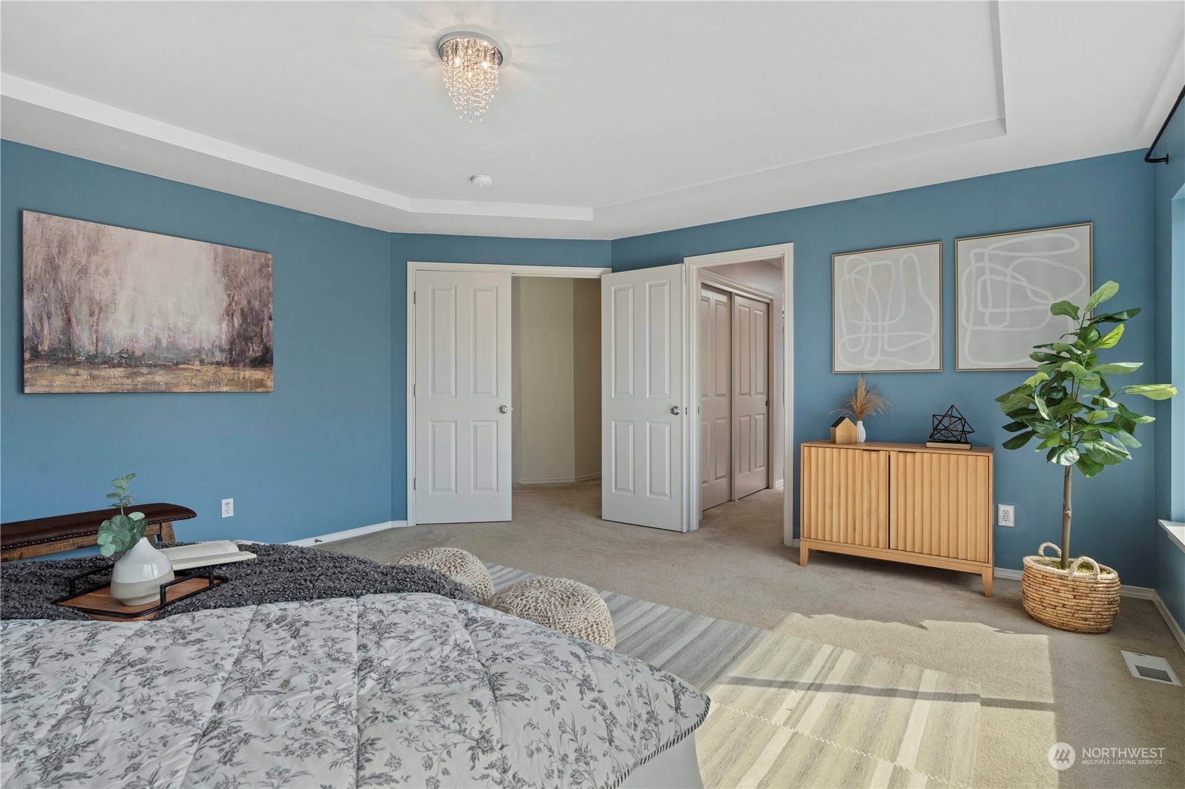 4410 239th Place Southeast Bothell, WA 98021 - Photo 23 of 40 a bedroom with a bed and a potted plant