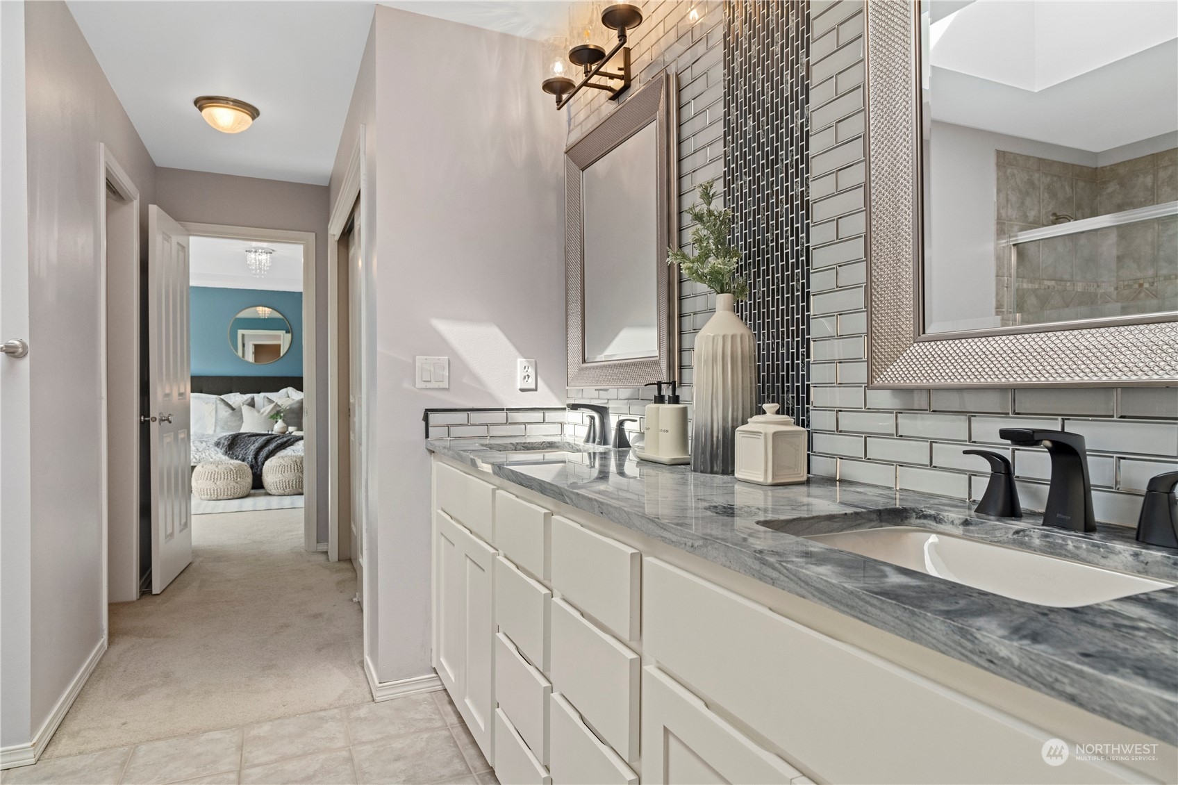 4410 239th Place Southeast Bothell, WA 98021 - Photo 27 of 40 a bathroom with a sink and a mirror