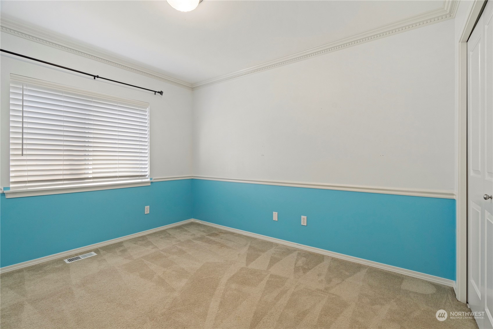 4410 239th Place Southeast Bothell, WA 98021 - Photo 30 of 40 a room with a fan and a window