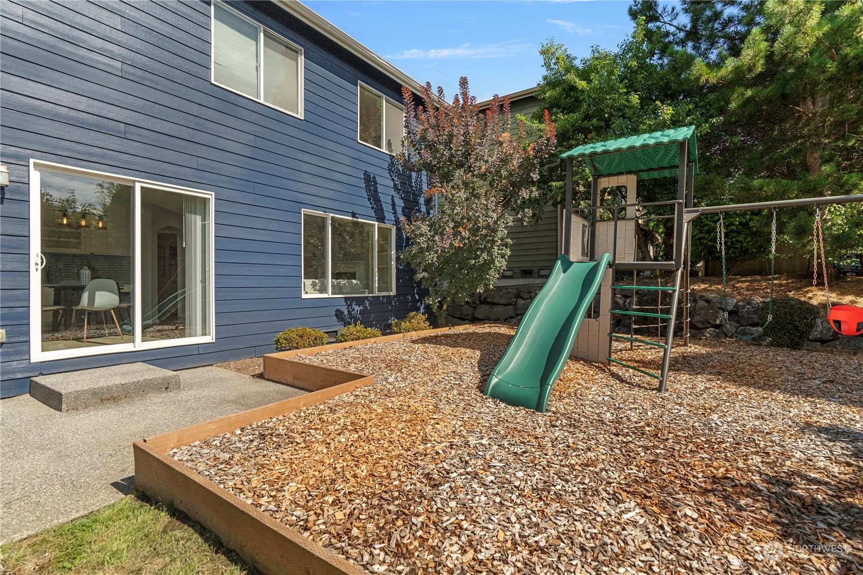 4410 239th Place Southeast Bothell, WA 98021 - Photo 35 of 40 a view of a backyard with a slide