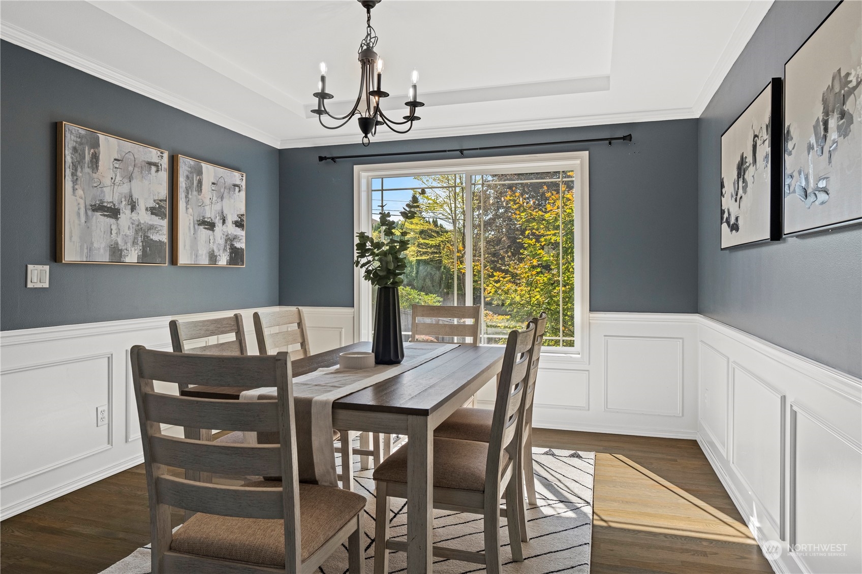 4410 239th Place Southeast Bothell, WA 98021 - Photo 7 of 40 a view of a dining room with furniture window and wooden floor