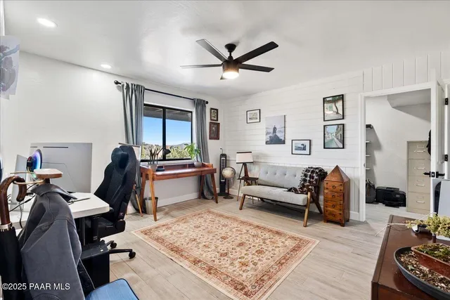 a view of a balcony with wooden floor