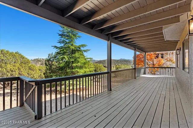 a view of a mountain from a balcony
