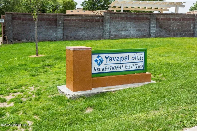 a view of workspace with bookshelf and a bookshelf
