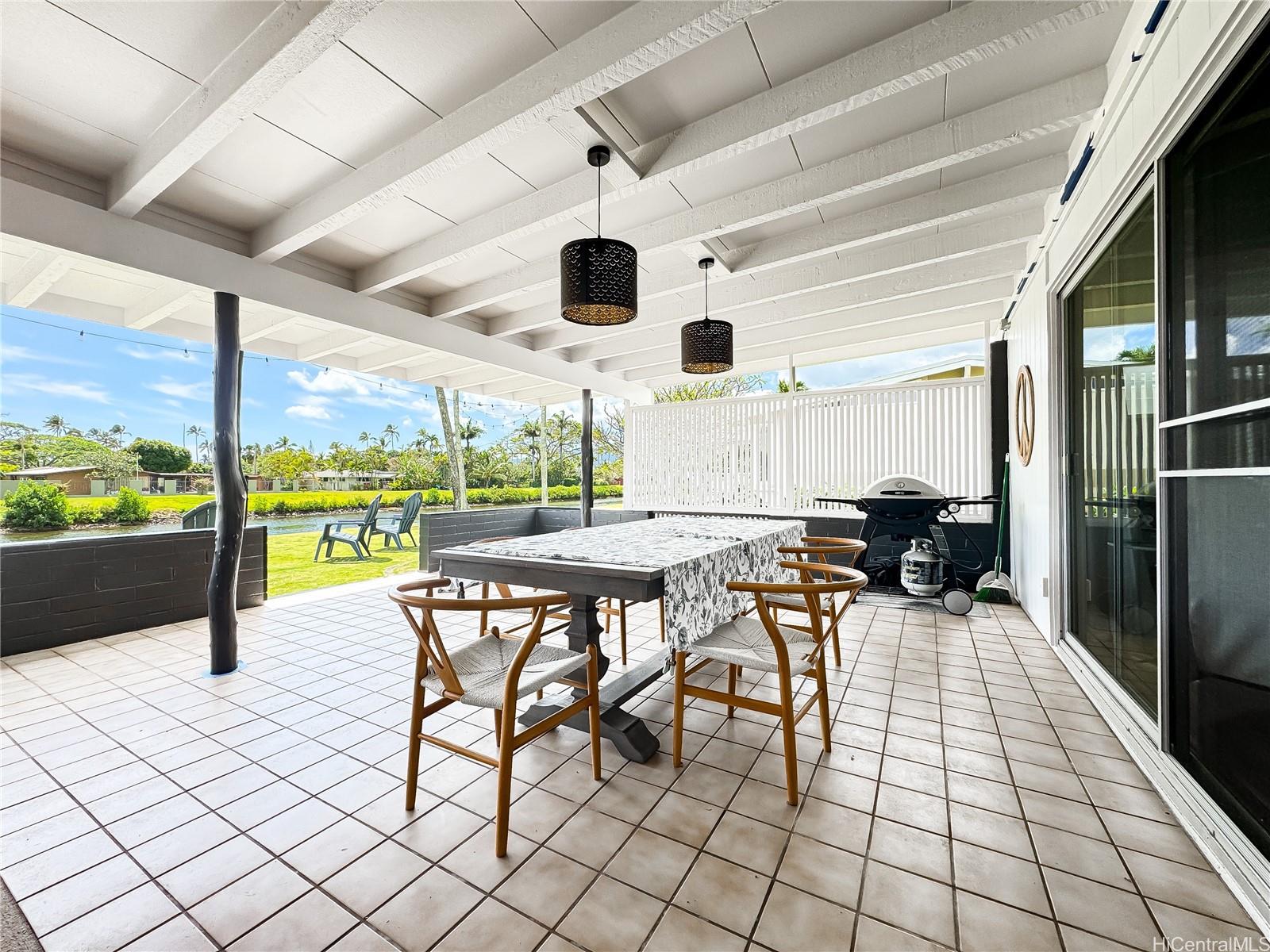 346 Ilimalia Loop Kailua, HI 96734 - Photo 14 of 24 a view of a patio with a table and chairs in a patio