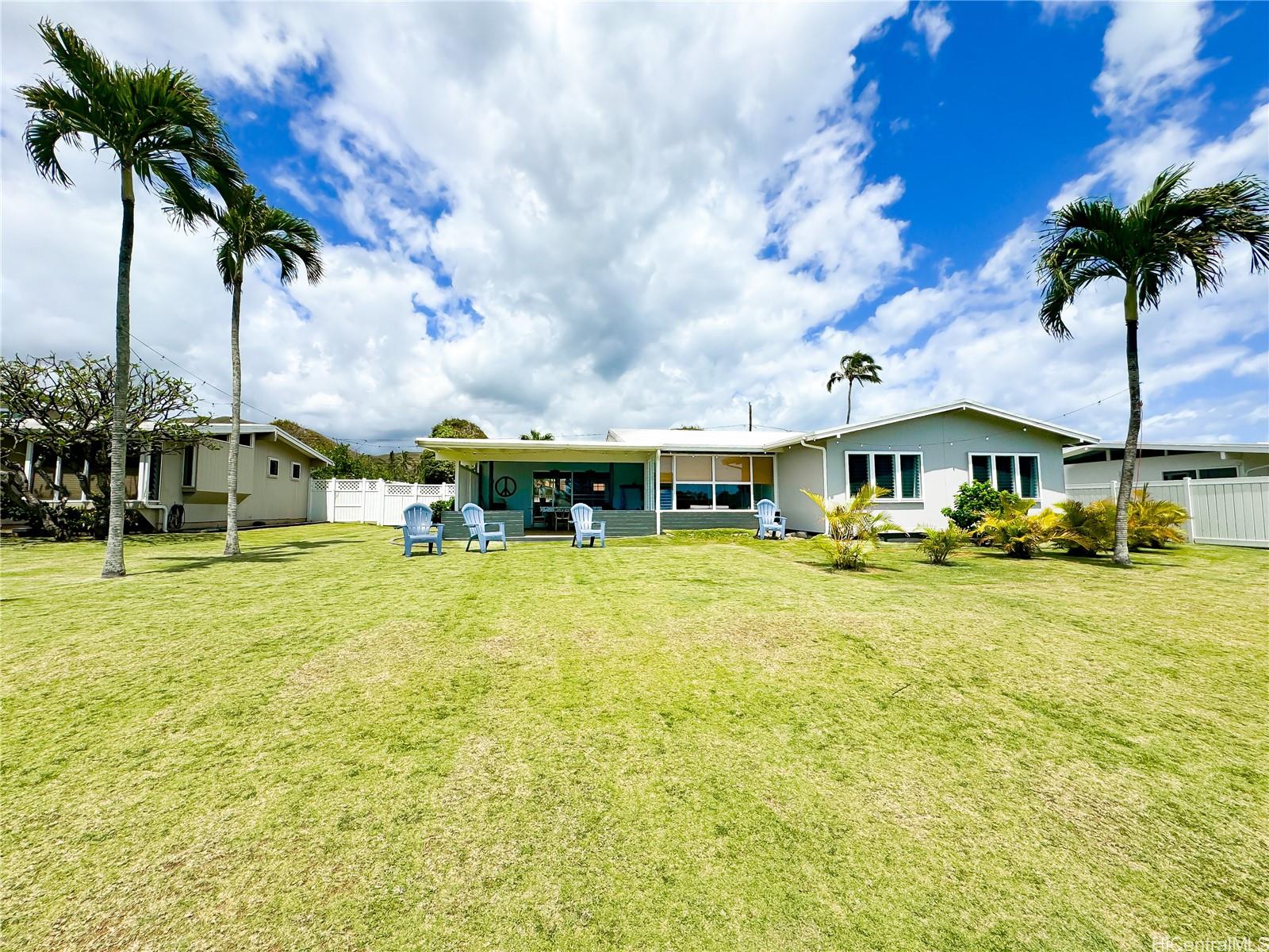 346 Ilimalia Loop Kailua, HI 96734 - Photo 18 of 24 a front view of a house with swimming pool having outdoor seating