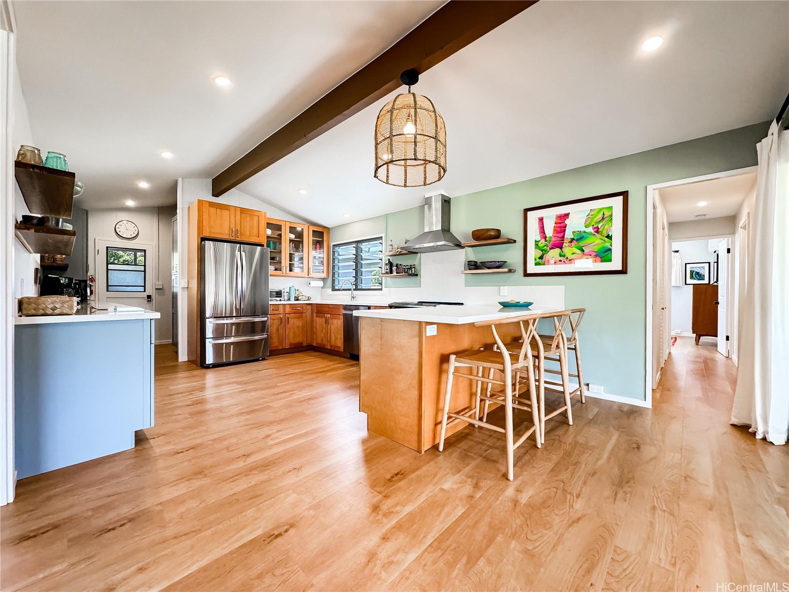 346 Ilimalia Loop Kailua, HI 96734 - Photo 2 of 24 an open kitchen with a table and chairs