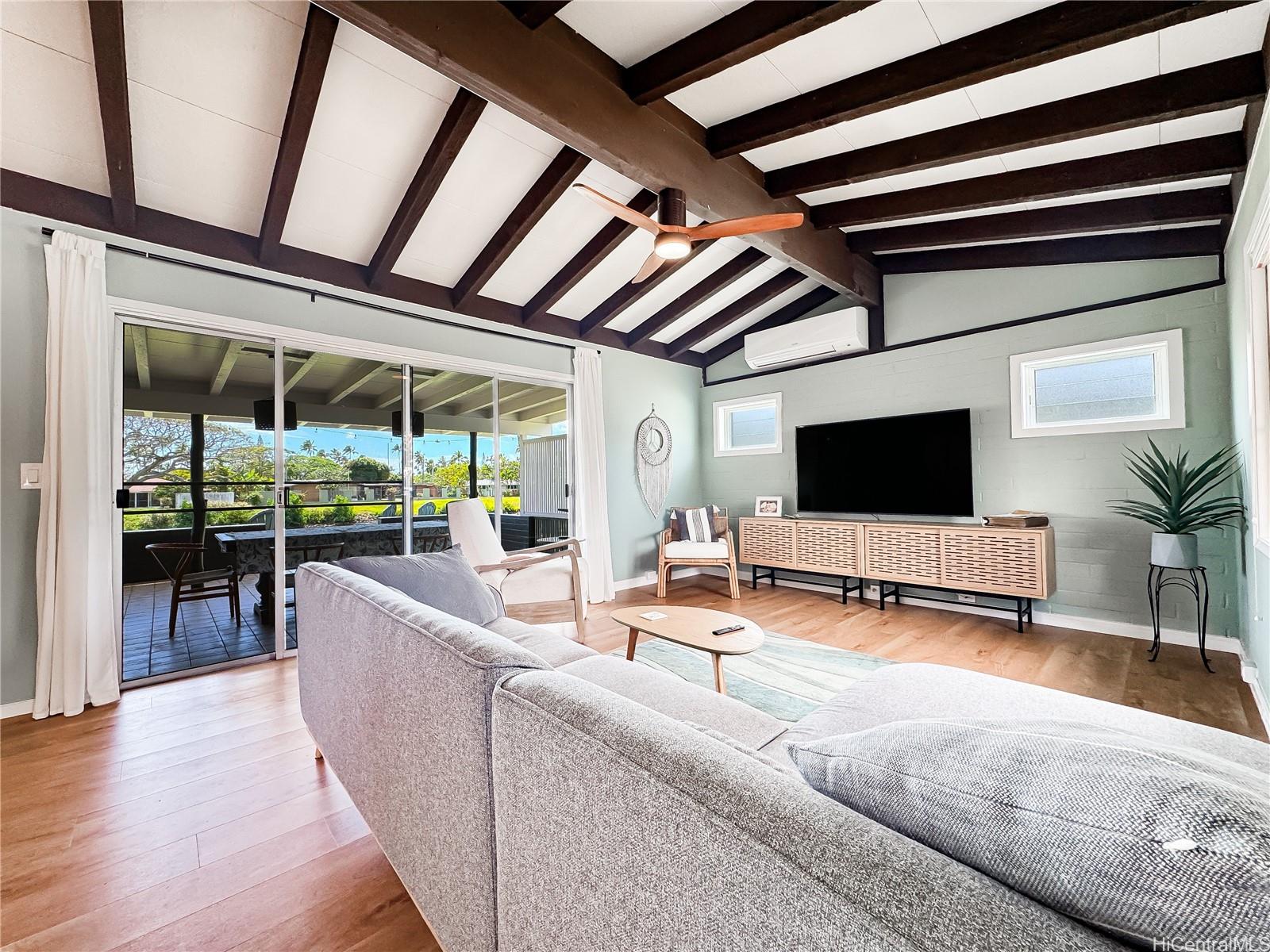 346 Ilimalia Loop Kailua, HI 96734 - Photo 5 of 24 a living room with furniture and a flat screen tv