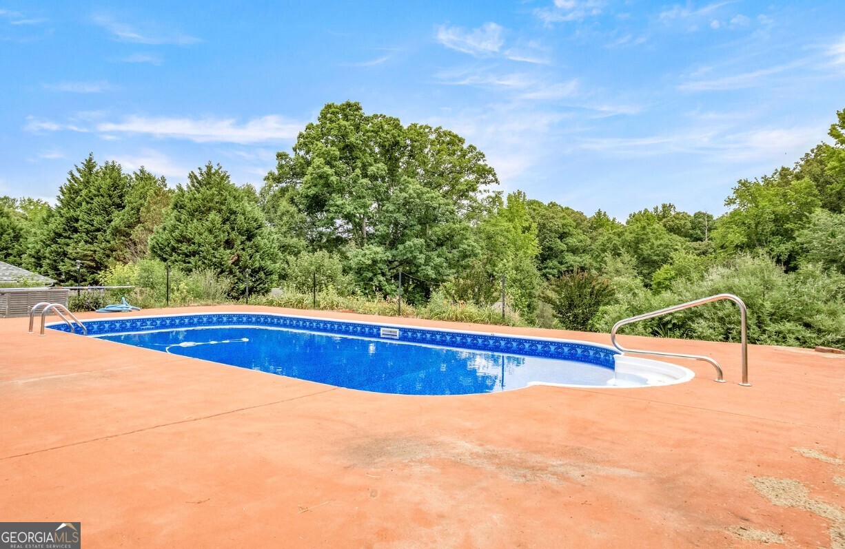 82 Newton Road LaGrange, GA 30240 - Photo 38 of 45 a view of swimming pool with a yard