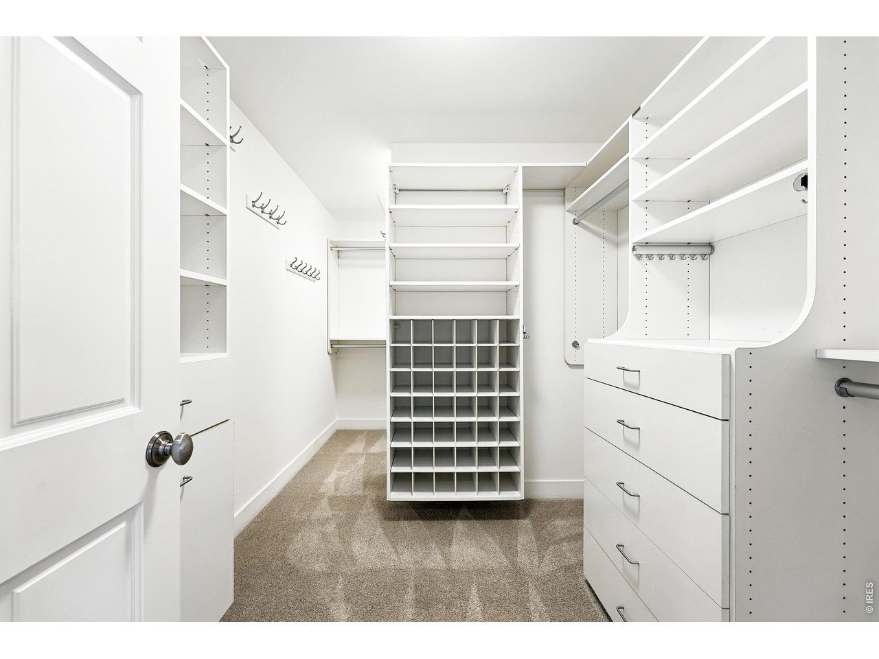 4557 Apple Way Boulder, CO 80301 - Photo 30 of 42 The spacious walk-in closet provides thoughtful organization and generous storage, designed to keep daily routines simple and streamlined.