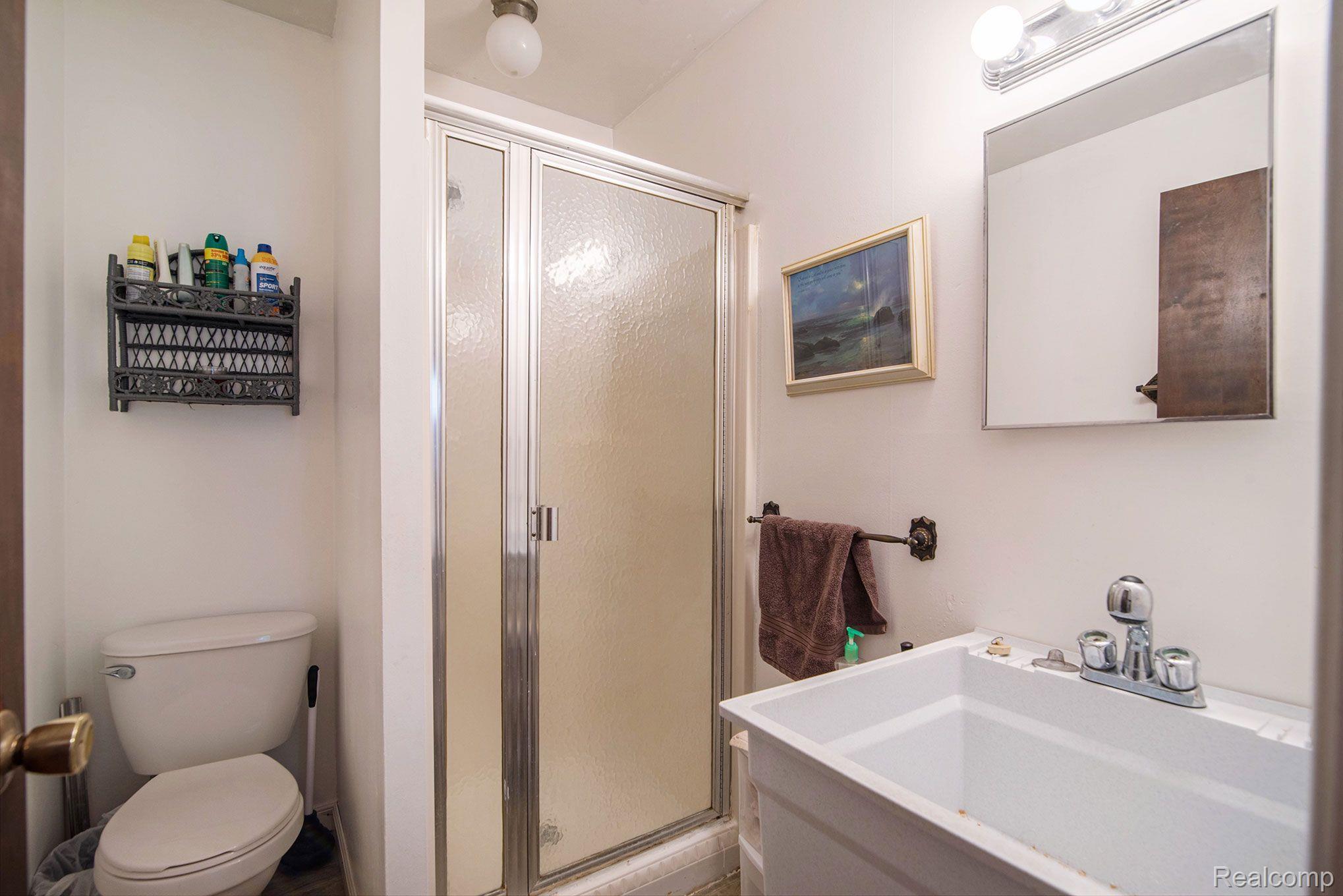 1224 Baldwin Road Lapeer, MI 48446 - Photo 6 of 19 Bathroom by the garage entry
