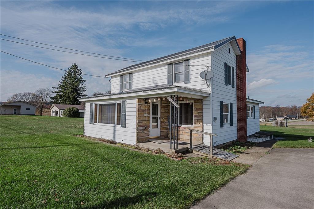 151 Hemlock Road Commodore, PA 15729 - Photo 1 of 50 a view of a house with a yard