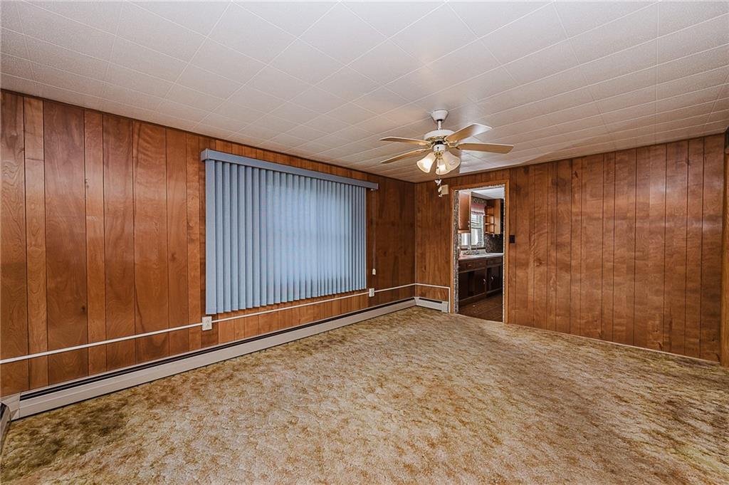 151 Hemlock Road Commodore, PA 15729 - Photo 12 of 50 an empty room with closet and a ceiling fan