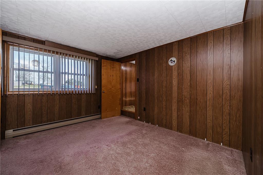 151 Hemlock Road Commodore, PA 15729 - Photo 19 of 50 a view of an empty room with wooden walls