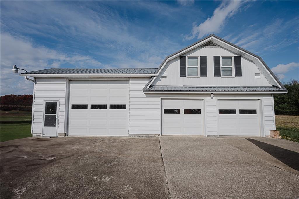 151 Hemlock Road Commodore, PA 15729 - Photo 2 of 50 a view of a house with a garage