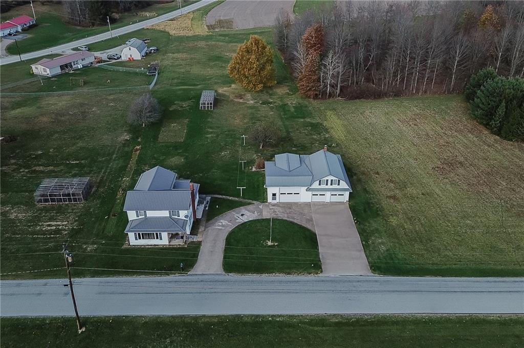 151 Hemlock Road Commodore, PA 15729 - Photo 39 of 50 an aerial view of a house with garden space and street view