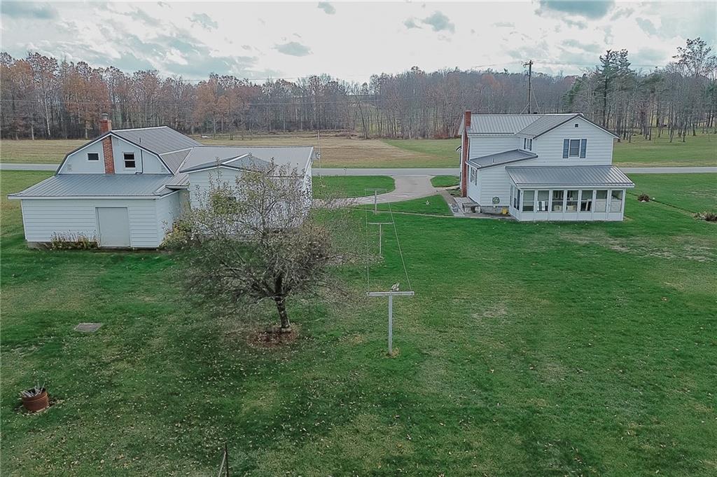 151 Hemlock Road Commodore, PA 15729 - Photo 40 of 50 a view of a house with a yard