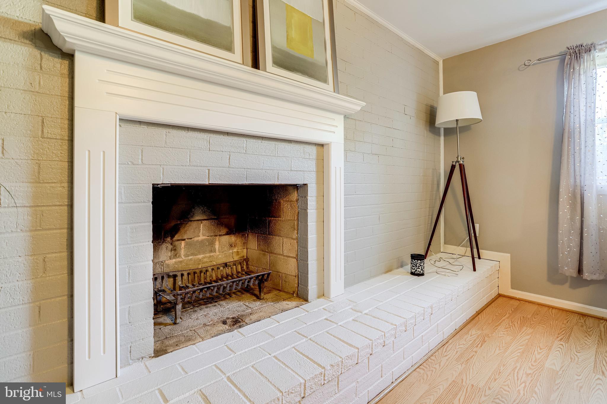6905 Conservation Drive Springfield, VA 22153 - Photo 17 of 41 Wood burning fireplace