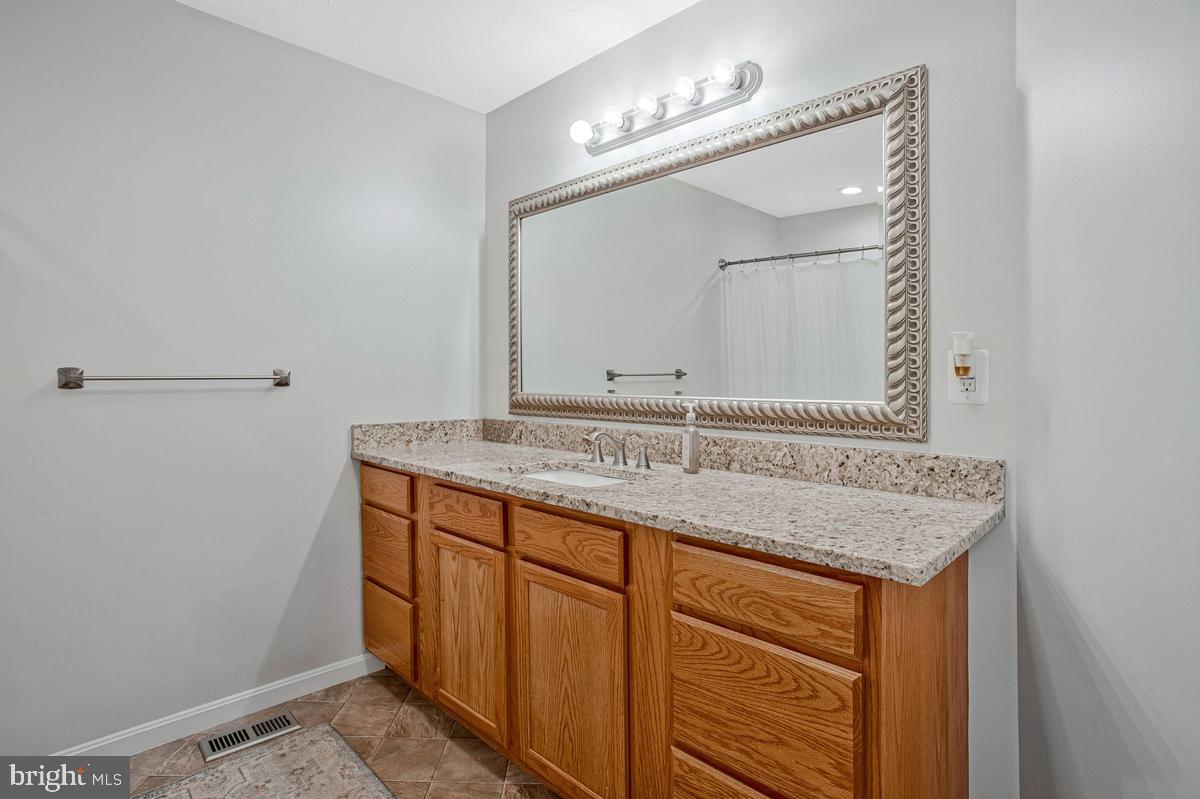 40295 Busy Corner Road Leonardtown, MD 20650 - Photo 29 of 34 Elegant bathroom with modern finishes.