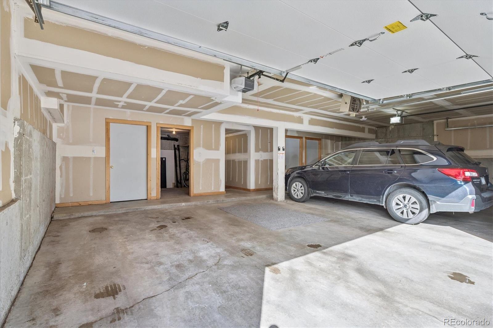 23666 Pondview Place, Unit H Golden, CO 80401 - Photo 17 of 19 a view of a car garage