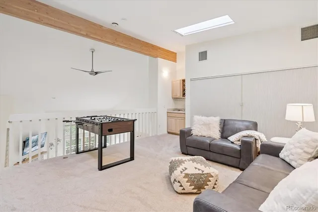 a living room with furniture and a couch