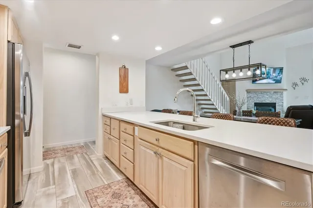 a spacious bathroom with a sink double vanity and a mirror