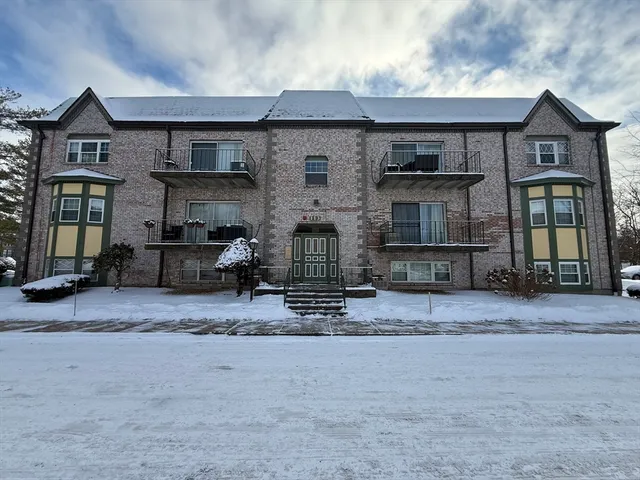 front view of a house with a street