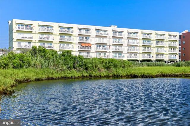 a view of a building with a garden