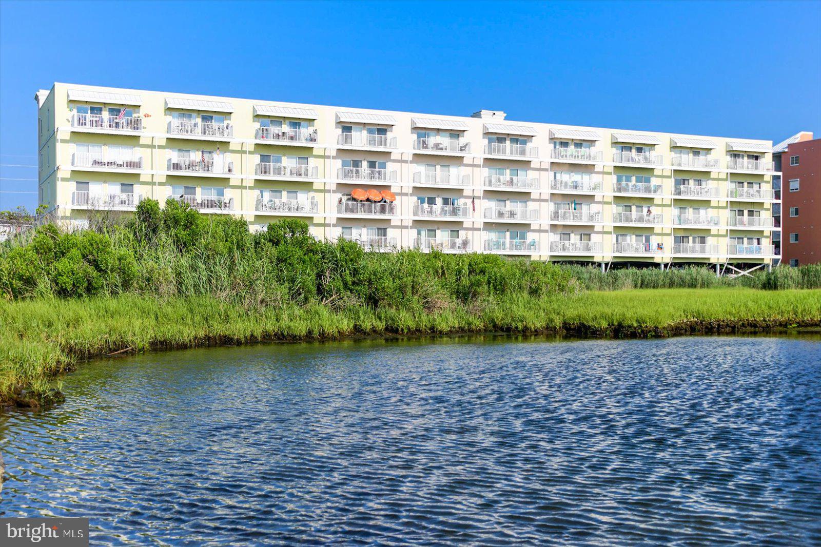 a view of a building with a garden
