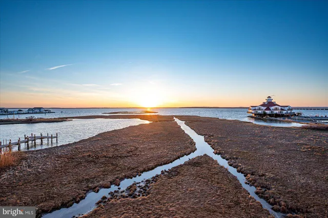 a view of a lake with a big yard