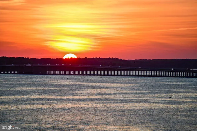 a view of a lake with a yard