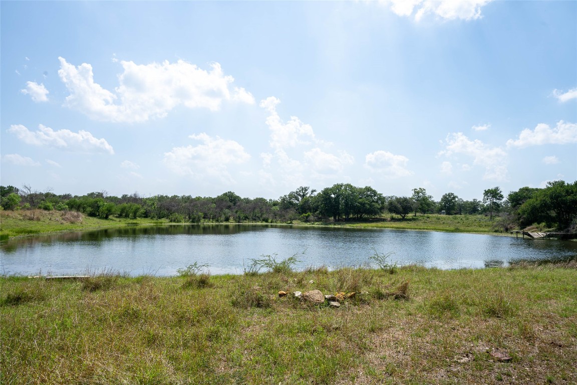 0 Gravel Pit Road Kingsbury, TX 78638 - Photo 7 of 30 a view of a lake with a city
